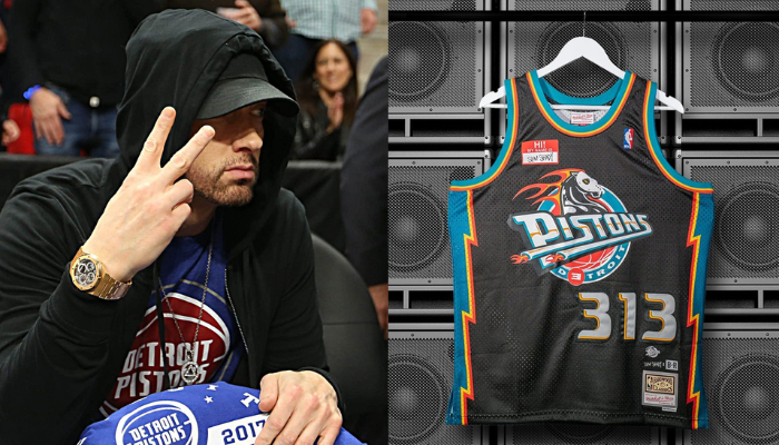 Regata masculina Slim Shady 313, em cores vibrantes, com logotipos bordados da marca Mitchell & Ness e do Detroit Pistons. Inspirada na colaboração entre Eminem e a NBA, a peça apresenta um design moderno e confortável, ideal para fãs de hip-hop e basquete.