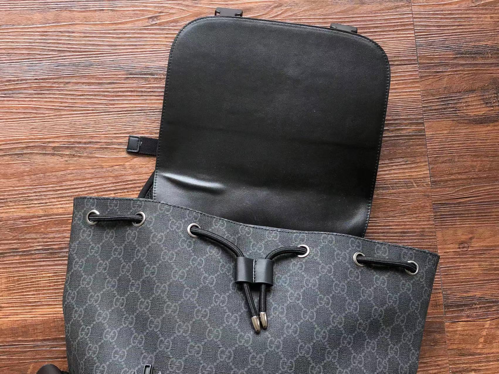 Experience the Power of Luxury with the Gucci GG Supreme Black-Grey