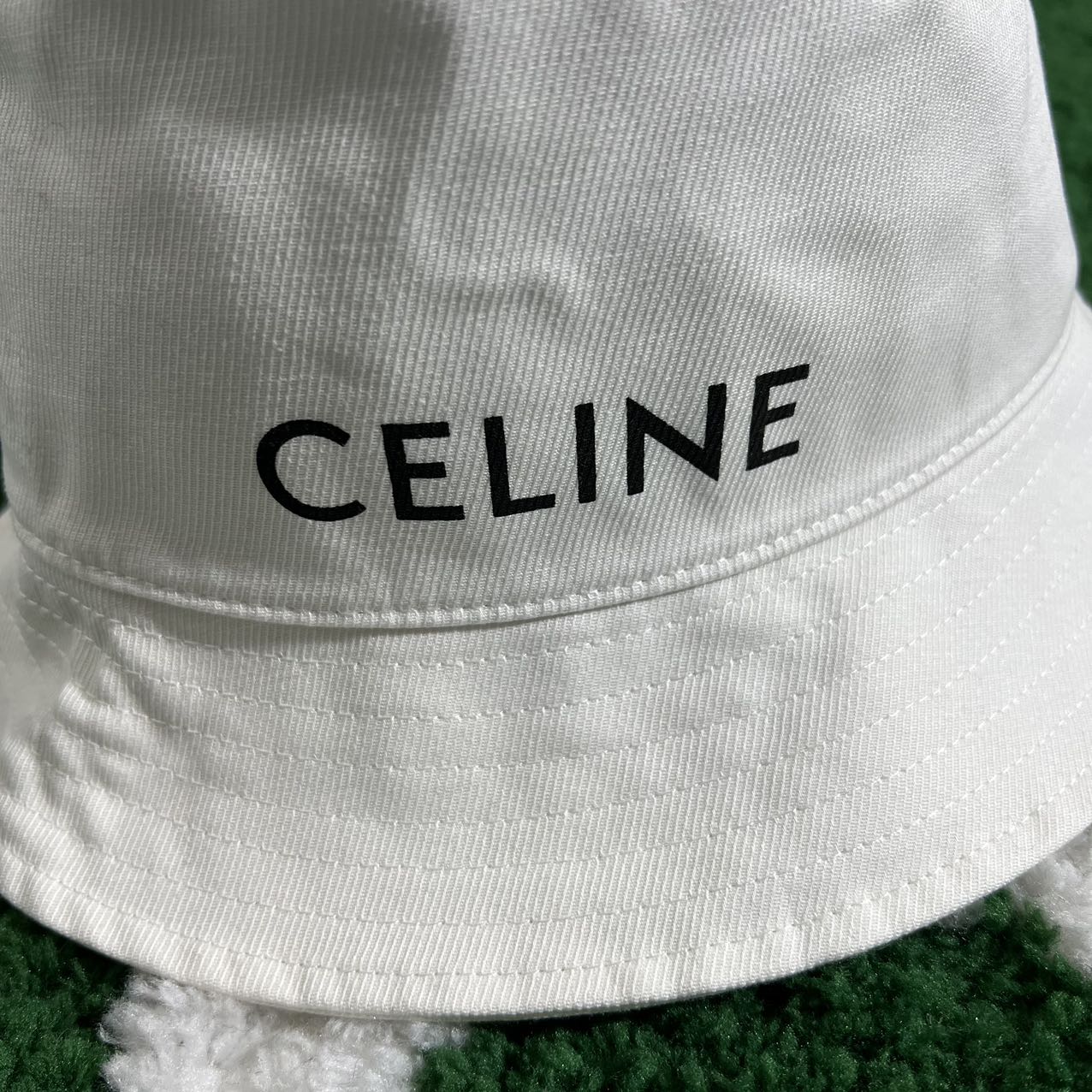 Celine White Bucket Hat: The Ultimate Symbol of Casual Luxury."
