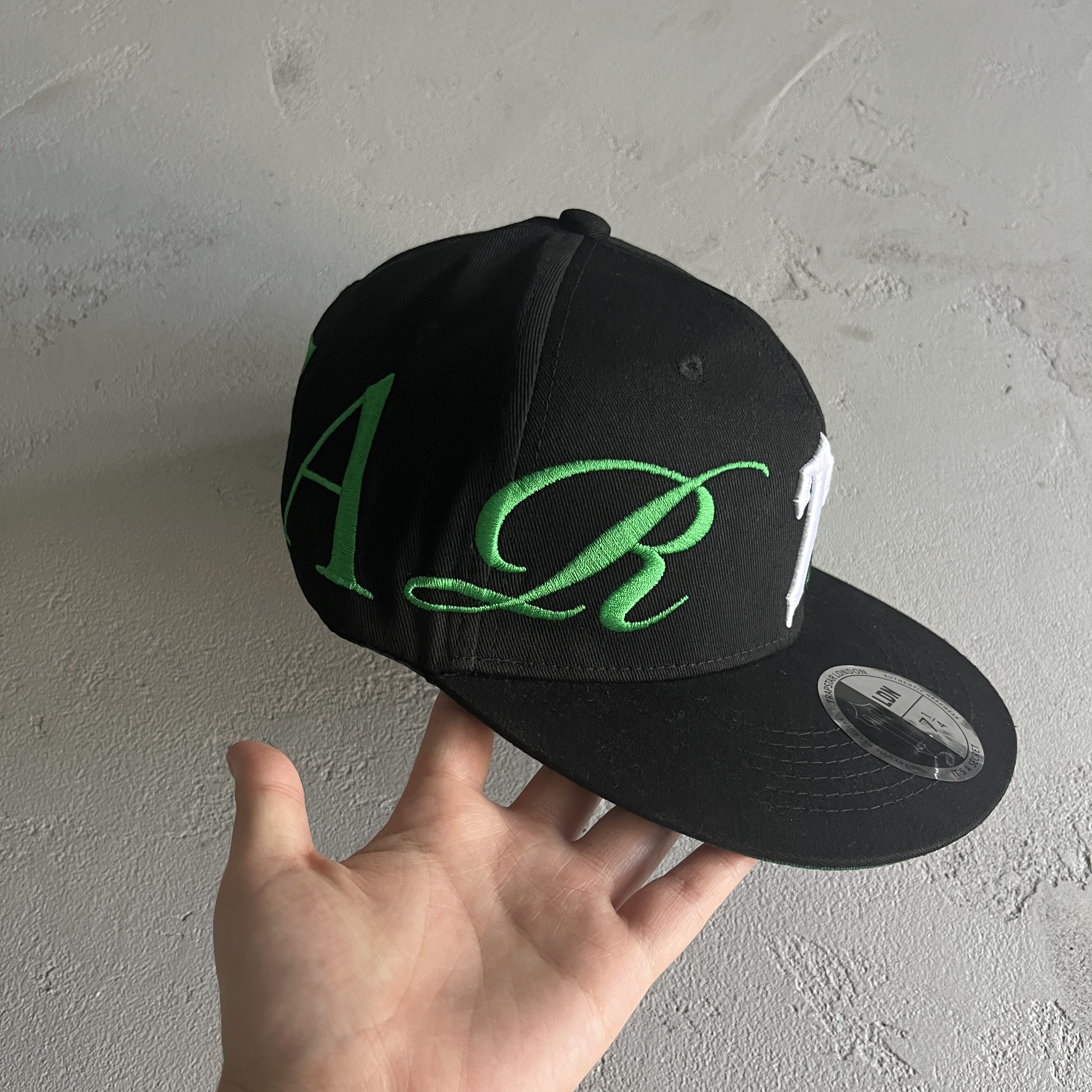 Black-Green Trapstar Cap: Elevate Your HYPE & DRIP