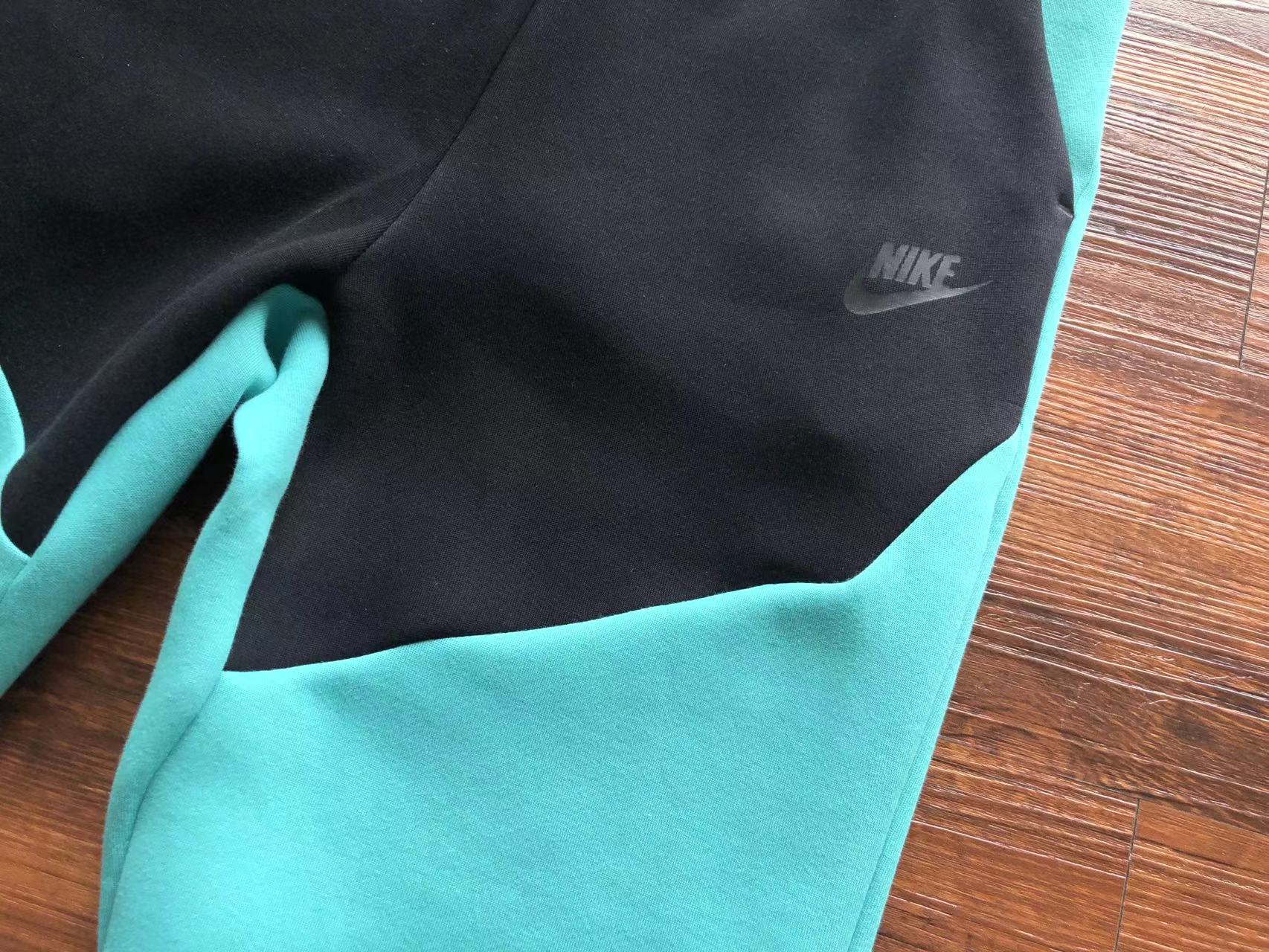 calca-nike-tech-fleece-joggers-preto-teal