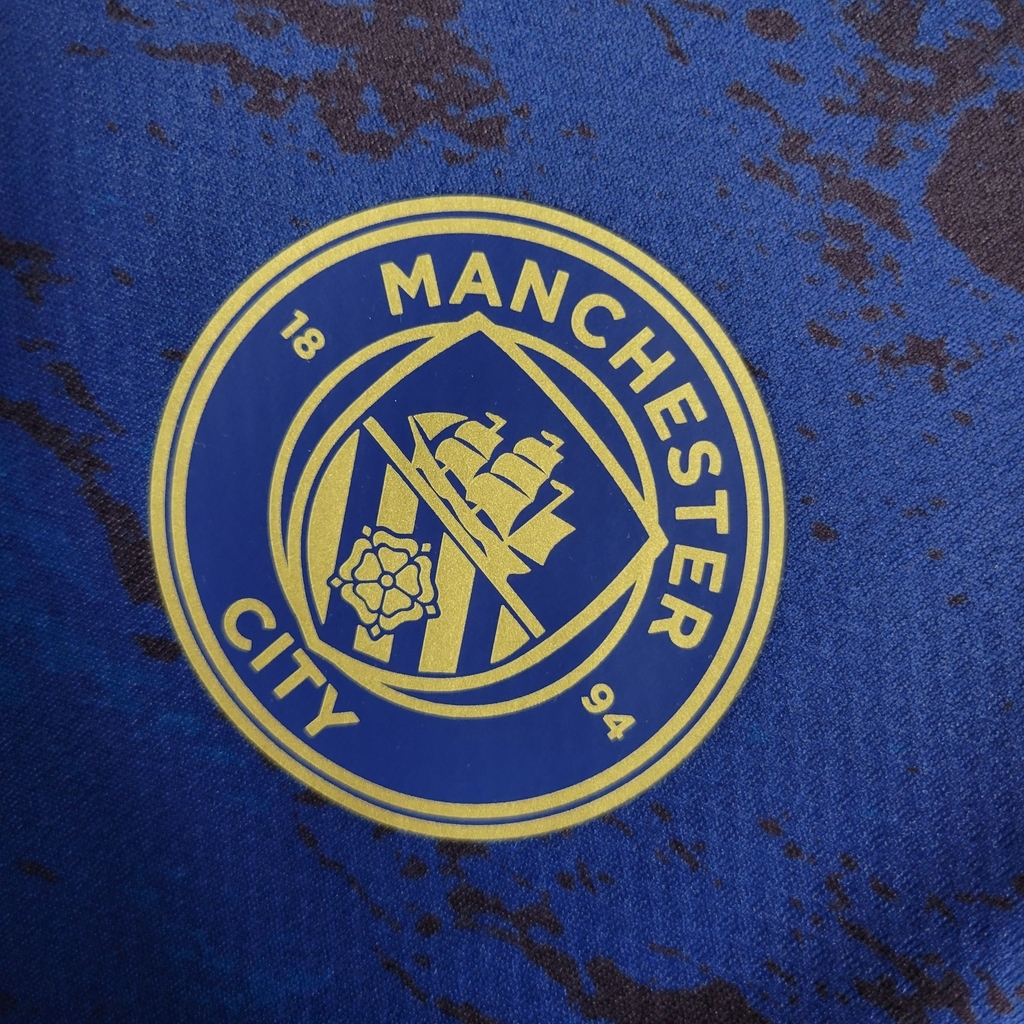 Camisa Manchester City 22/23 Versão Torcedor Pré-Jogo - Azul