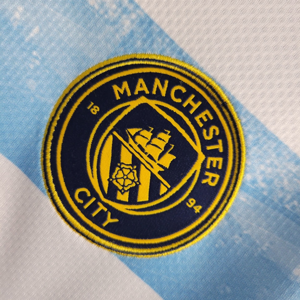 Camisa Manchester City 22/23 Versão Torcedor Pré-Jogo - Azul