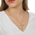 Colar Crucifixo Todo Cravejado Em Zircônia Com Pedra Verde E Cristal Folheado A Ouro 18k - comprar online