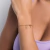 Pulseira cruz rommanel folheada a ouro - tam.19 552036 na internet