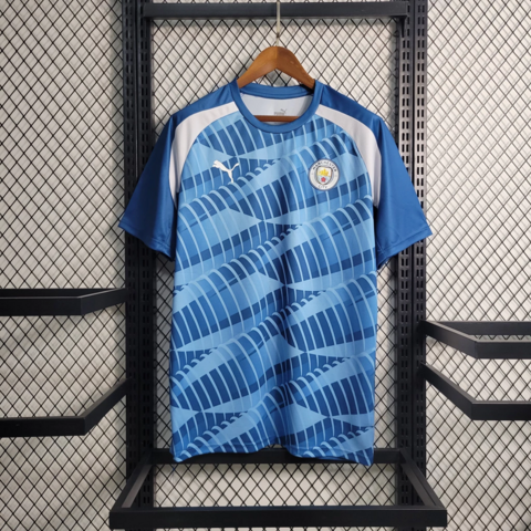 Camisa Manchester City 22/23 Versão Torcedor Pré-Jogo - Azul