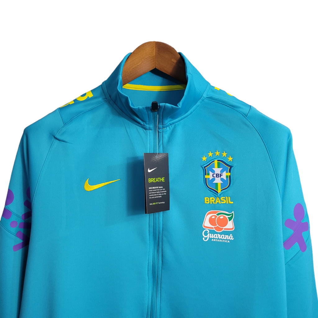 Jaqueta Corta-Vento Brasil 22/23 Masculino Nike - Azul com detalhes em  amarelo