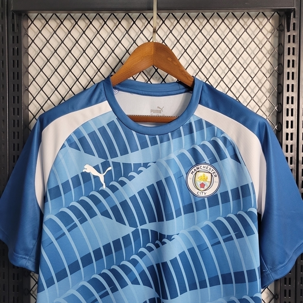 Camisa Manchester City 22/23 Versão Torcedor Pré-Jogo - Azul