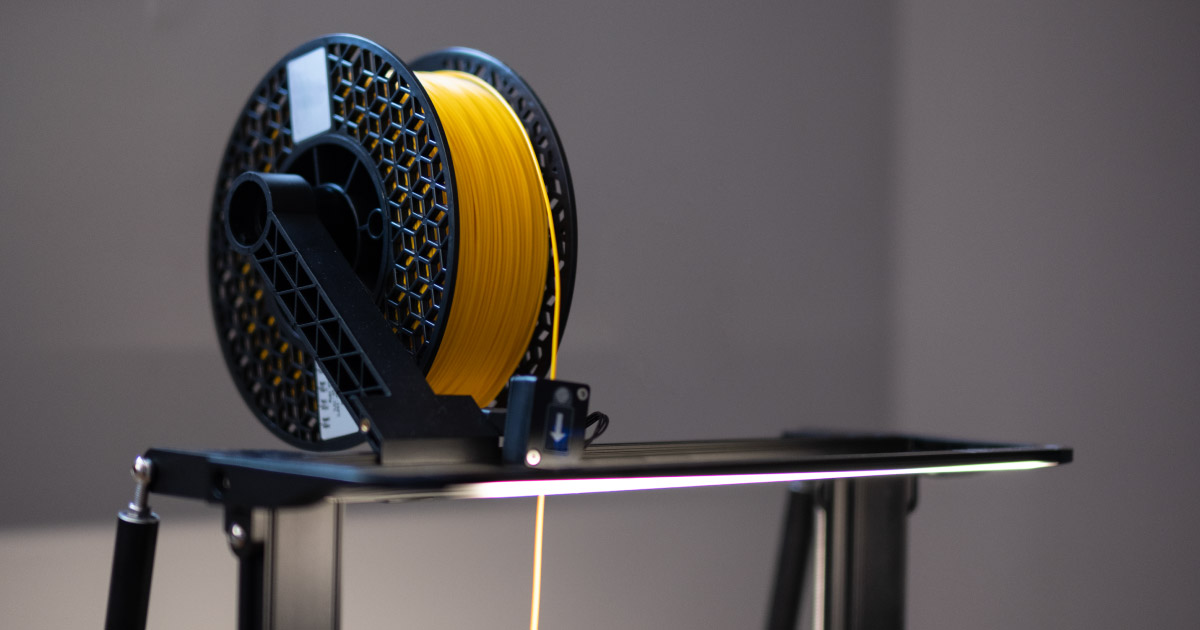 detalhe de um filamento em uma impressora 3d 