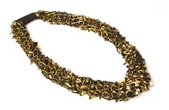 Collar tricot con torsión Dorado/Negro - shop.normarinaudo.tiendanube.com