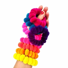 Colita con pompones