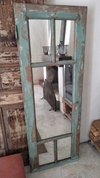 Espejo realizado con puerta de pinotea