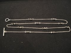 Cadena rolo con mini calaveras - comprar online