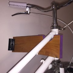 soporte para colgar la bici bicicleta soporte de madera mueble para bici colgar bici caño bajo Hocico Rosa accesorios bici plegable