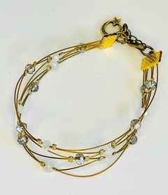 Art. 2195 Brazalete Scarlette gold y silver,color verde, negro, marfil y color cristal. - comprar online