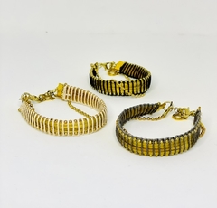 Art. 2010 Pulsera brazalete tejida Gold negra.