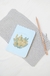 COMBO CUADERNO FLORES + NECESSAIRE + LÁPIZ en internet