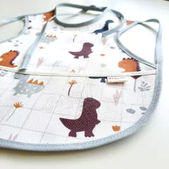 Babero DELANTAL CANGURO DINOS - comprar online