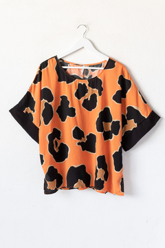 Blusa MEL, Blusa con mangas caídas y puños a contratono.