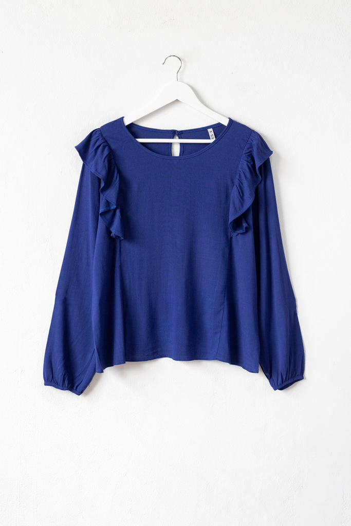 Blusa con volados discount en el cuello