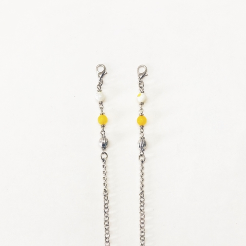 Soporte para barbijo amarillo
