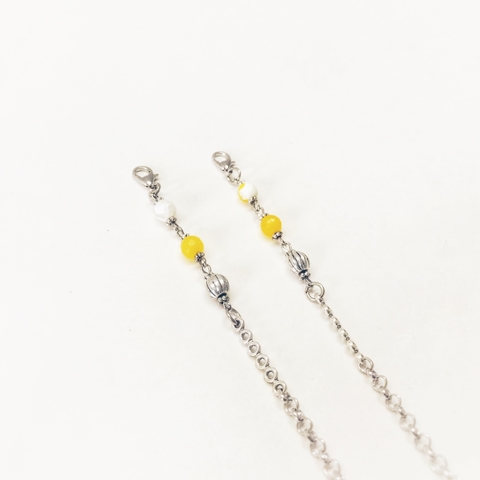 Soporte para barbijo amarillo