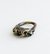 Anillo Lyra dorado y negro en internet