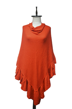 PONCHO CON VOLADOS TEJIDO en internet