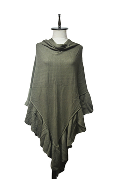 PONCHO CON VOLADOS TEJIDO