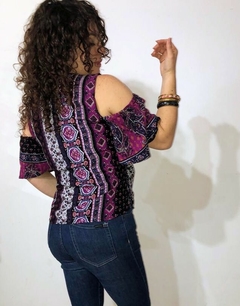 Blusa cruzada guardas violetas en internet