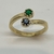 Anillo Pellizco Realizado en Oro Amarillo 18klts. Zafiros y esmeralda natural. - comprar online