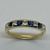Anillo Realizado en Oro Amarillo 18klts y Circoñas y Zafiro Carre. Medio sin Fin. - tienda online