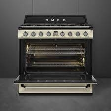 COCINA SMEG 50´S RETRO STYLE 90 CM MIXTA CREMA en internet