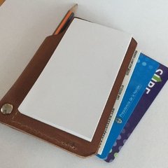 Tarjetero con anotador & boligrafo en internet
