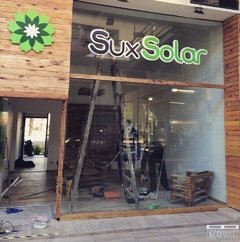 REVESTIMIENTO DE MADERA - FACHADA LOCAL COMERCIAL "SUX SOLAR" FUNES (copia)
