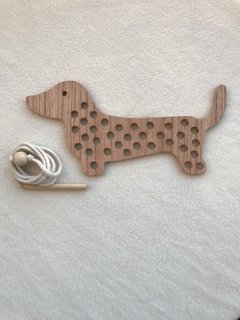 Perro Salchicha para enhebrar