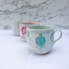 Taza Dora