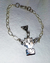 Pulsera con dije ¨Lechuza con carta¨ Acero