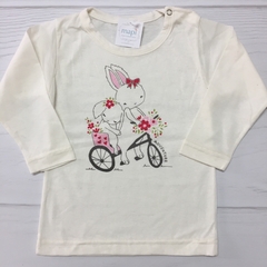 REMERA BEBE BEIGE CONEJITAS EN BICI