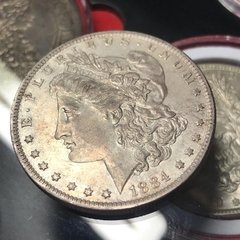 Morgan Dollar USA 1884 “O” AU (SOB/FC) na internet