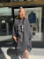Black poncho with fur details