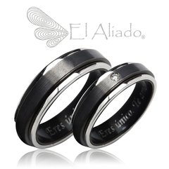 1079. Argollas negras en Titanio, biseles en plata.