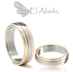 1085. Argollas en Titanio, oro amarillo y rosado 18k.
