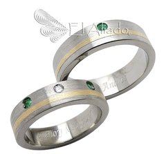 929. Argollas de matrimonio en Titanio mate con canal de oro 18k.