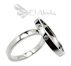 989. Argollas en Oro Blanco 18k planas.