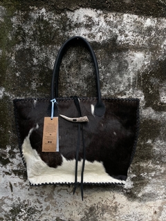 Cowhide Blanca y negra
