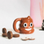 Taza Popó Emoji Marrón en internet
