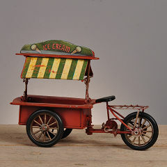 Adorno Carrito Triciclo Naranja Techo Amarillo Rayado en internet