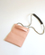 Bandolera estilo morral.  Tiene 3 formas de usarla: bicolor y monocromo al hombro; y cortita juntado los dos topes.  Cuero + cordón trenzado. Forrería estampada.  Combinación única.  Uno a uno. Hecho en Argentina.