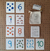 Juego por asociación de números y cantidades. Cartas didácticas. Receta de plastilina casera. Tienda de regalos. The Mix